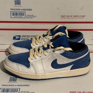 Nike Blue and White Low-Top Jordans
